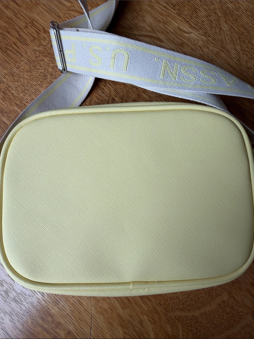 U.S. Polo Assn. Pale Yellow Crossbody Camera Bag with Branded Strap